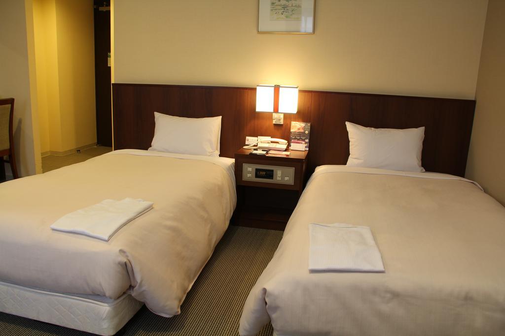 Hotel Sunroute New Sapporo Zimmer foto